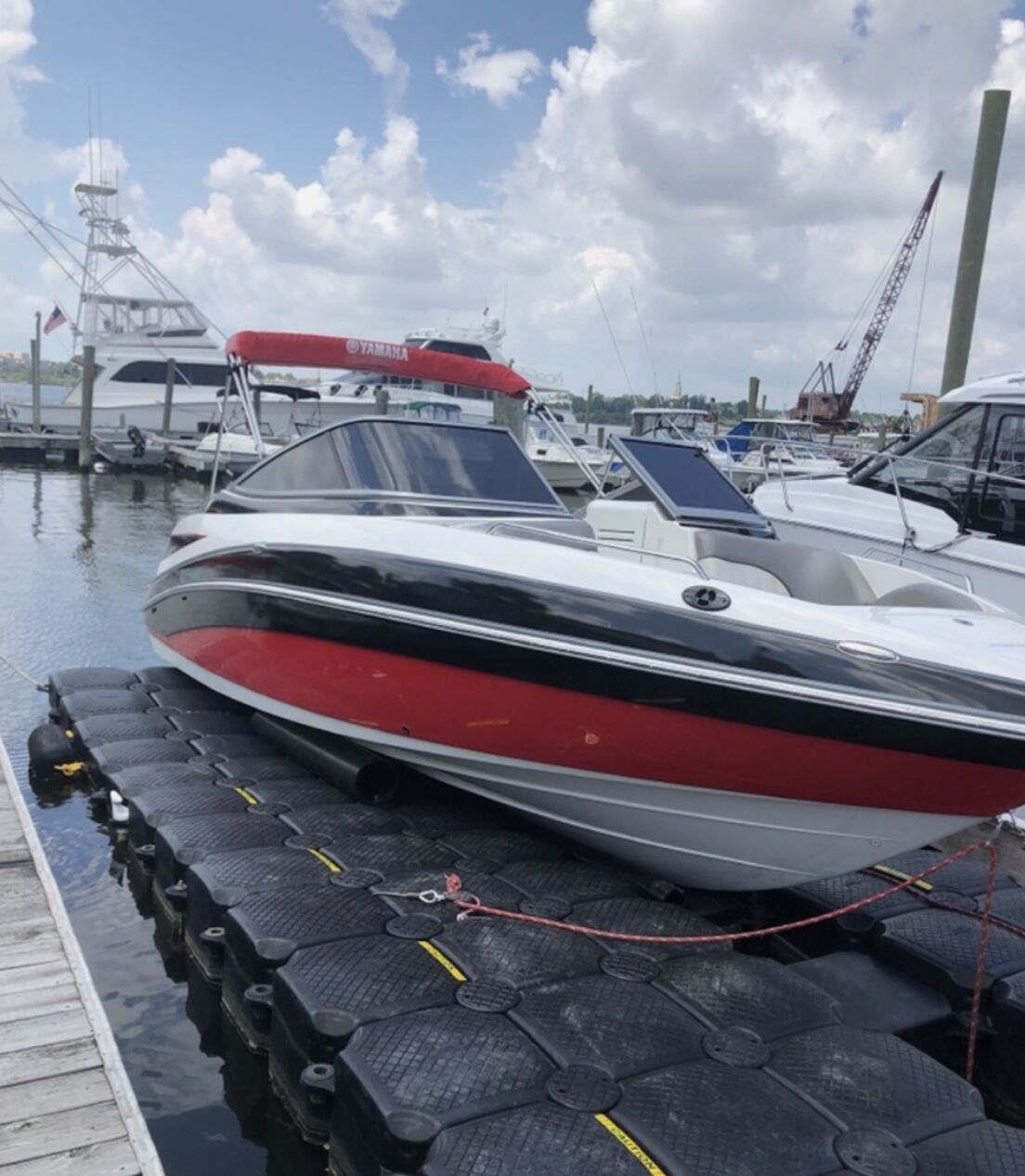 Floating boat dock section close-up with cleats