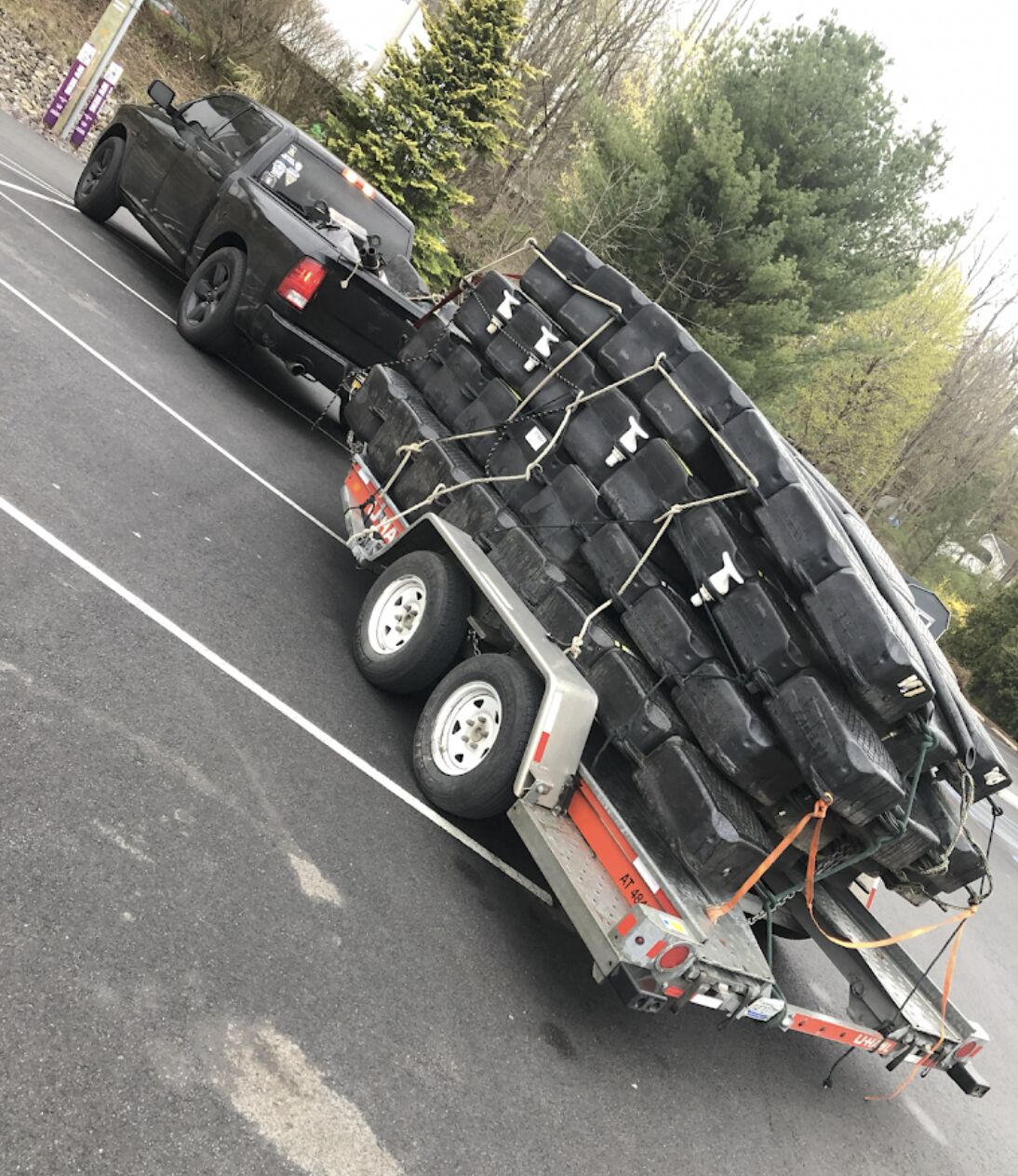 A1 Docks truck hauling used floating dock sections for evaluation